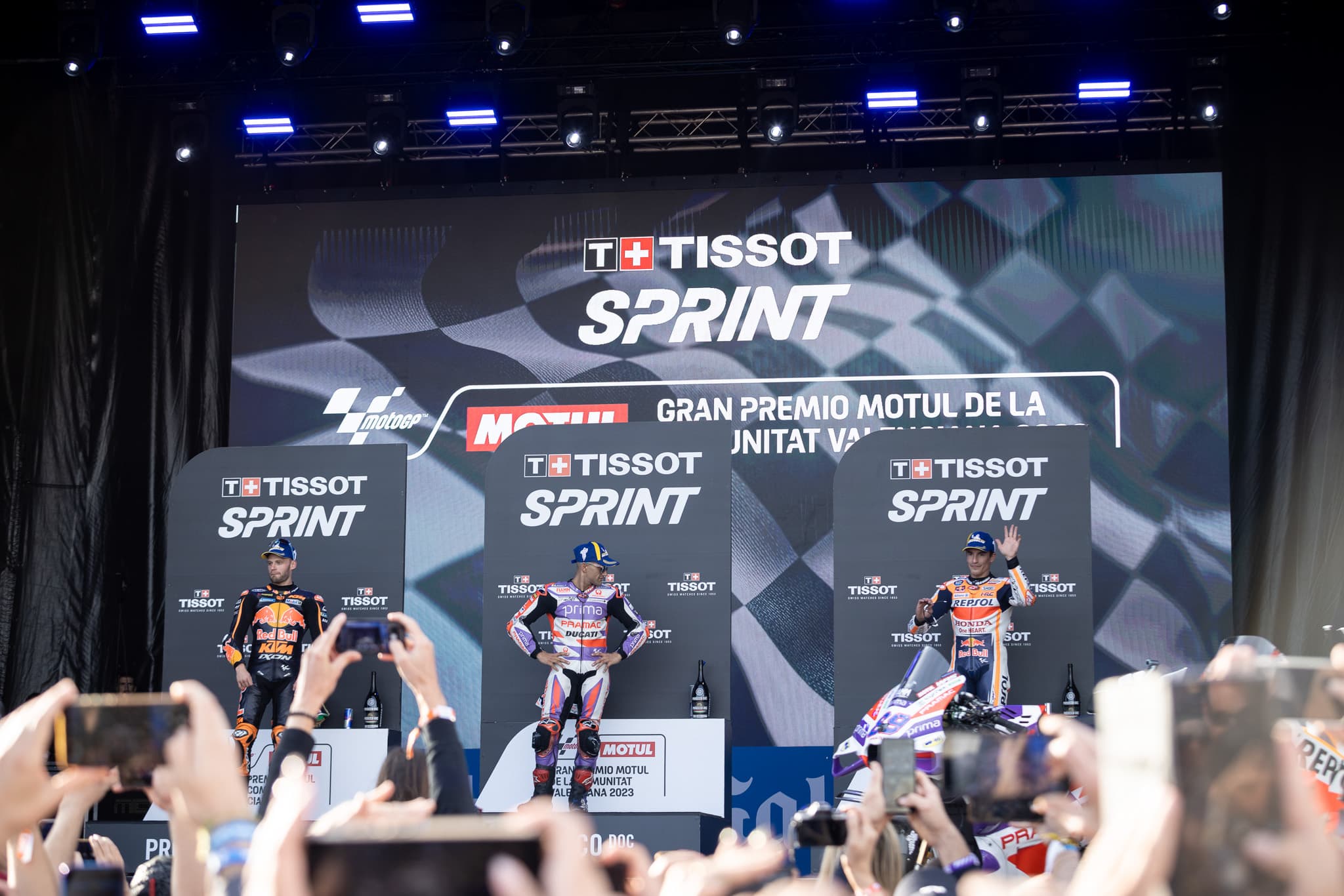 Brad Binder (left), Jorge Martín (middle), and Marc Márquez at the podium of the 2023 Valencia MotoGP sprint